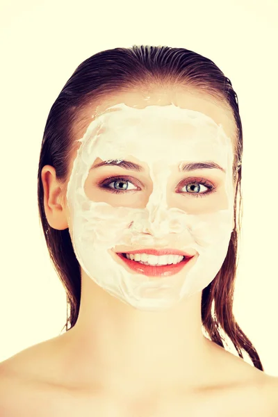 Woman with clay facial mask — Stock Photo, Image