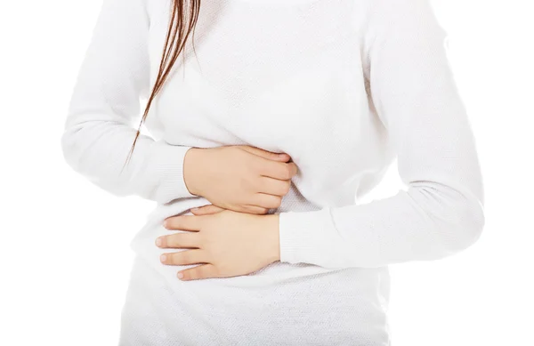 Mujer joven con problemas de estómago — Foto de Stock