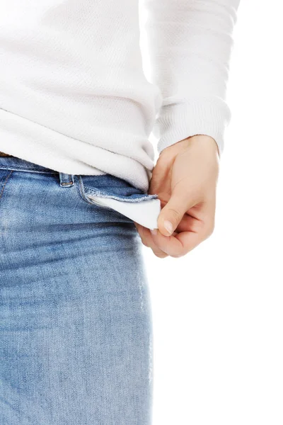 Young woman with empty pockets — Stock Photo, Image