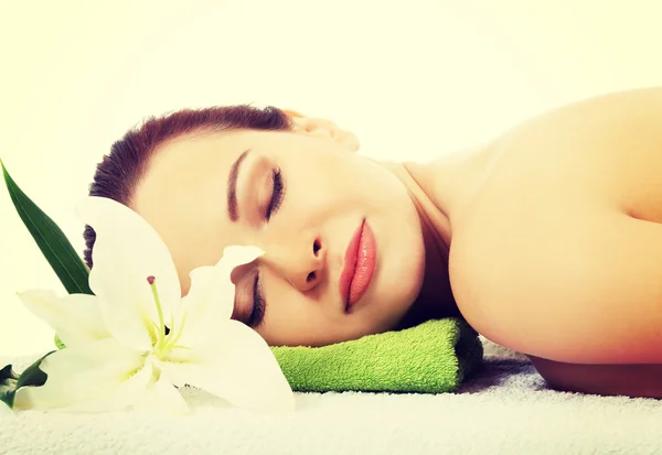 Woman lying at spa salon. Stock Photo