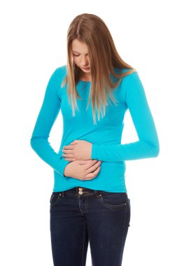 Karın ağrısı olan kadın