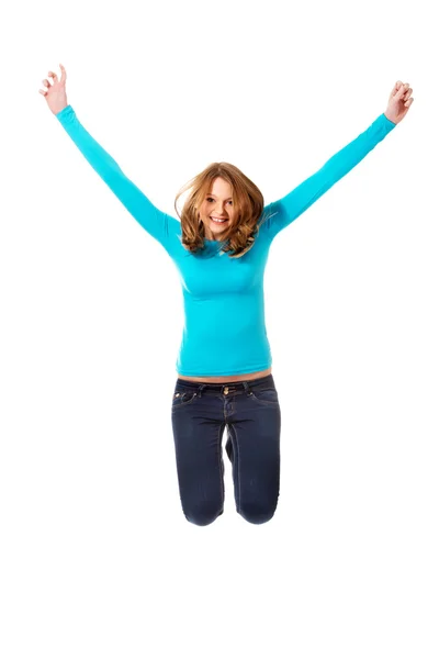 Young woman jumping with joy — Stock Photo, Image