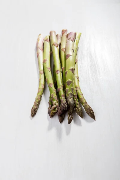 Green asparagus on the table — Stock Photo, Image