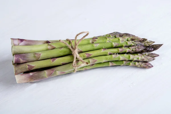 Green asparagus on the table — Stock Photo, Image