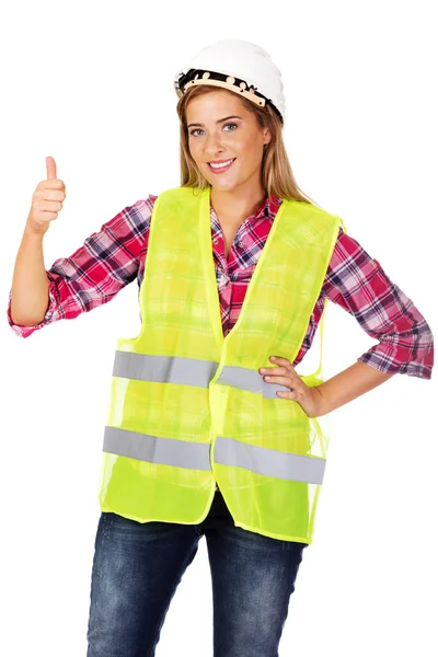 Joven sonrisa mujer constructora en chaleco —  Fotos de Stock