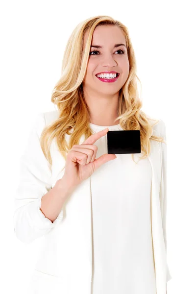 Happy woman showing business card, isolated over white backround. — Stock Photo, Image