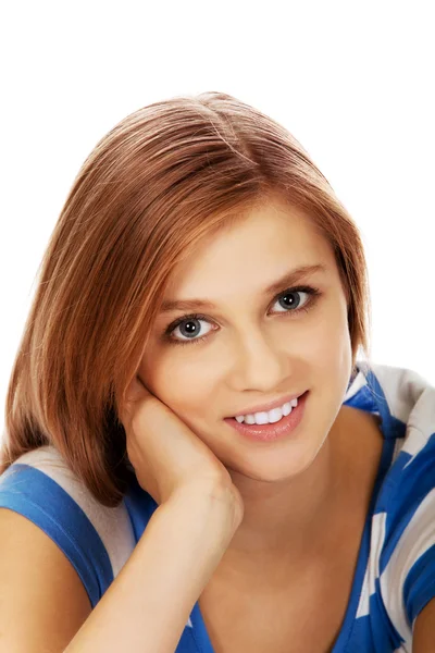 Pretty teenager girl smiling in cheerful mood Royalty Free Stock Images