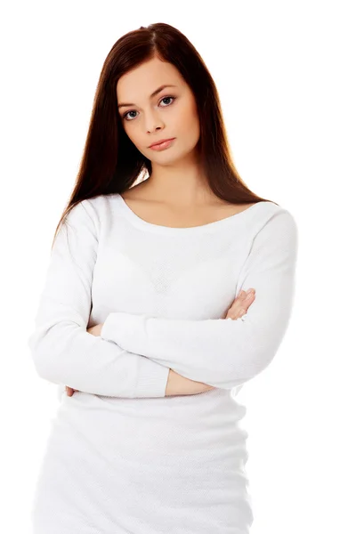 Annoyed young woman with arms crossed — Stock Photo, Image