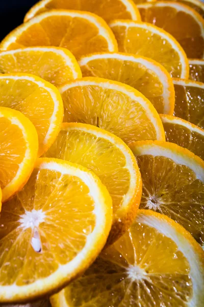 Foto da vicino di succose fette di arancia fresca — Foto Stock