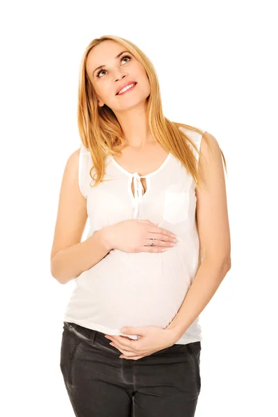 Pensive pregnant woman dreaming about child — Stock Photo, Image