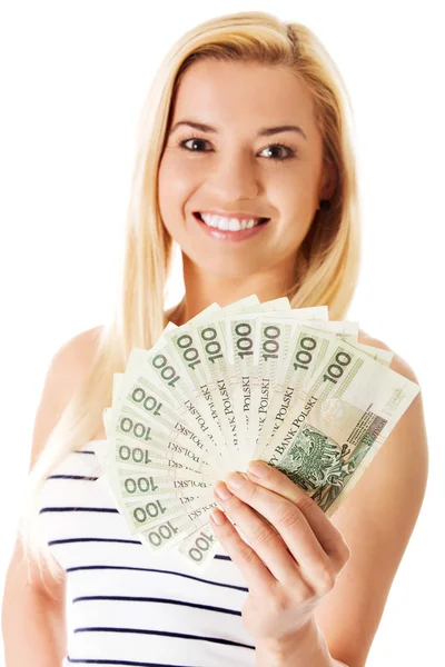 Attractive young lady holding cash and happy smiling over white background. — Stock Photo, Image