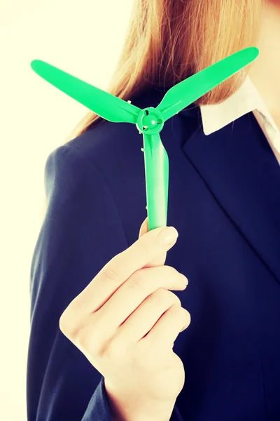 Business woman with green propeller. — Stock Photo, Image