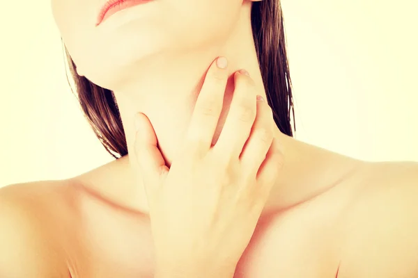 Beautiful sensual young woman touching her neck — Stock Photo, Image