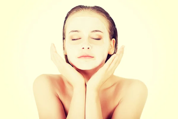 Woman with clay facial mask — Stock Photo, Image