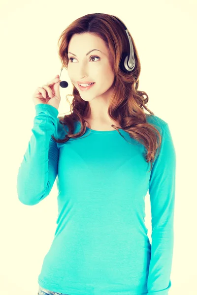 Assistente de call center sorrindo — Fotografia de Stock