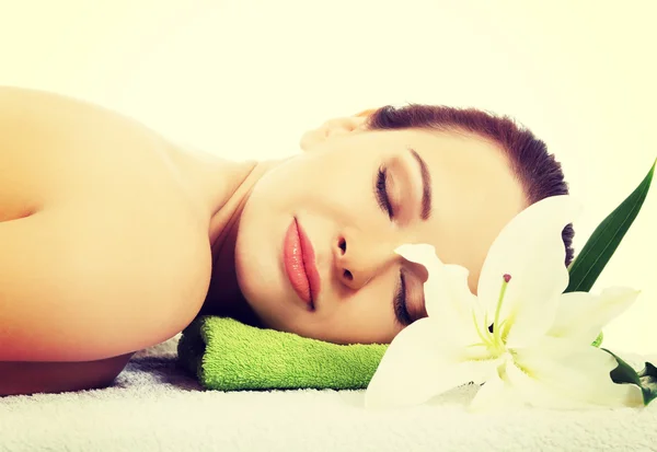 Woman lying at spa salon. Royalty Free Stock Photos