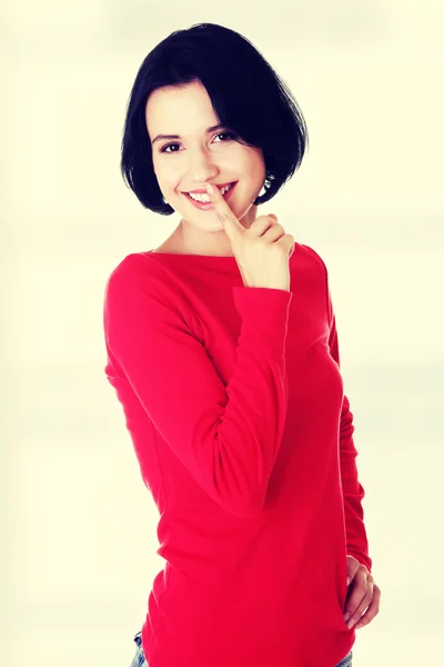 Mujer feliz haciendo un mantener un gesto tranquilo — Foto de Stock