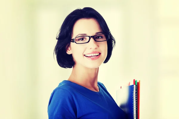 Happy student woman with notebooks — Stock Photo, Image