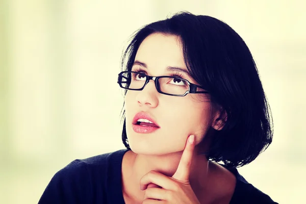 Young beautiful woman in casual clothes thinking — Stock Photo, Image