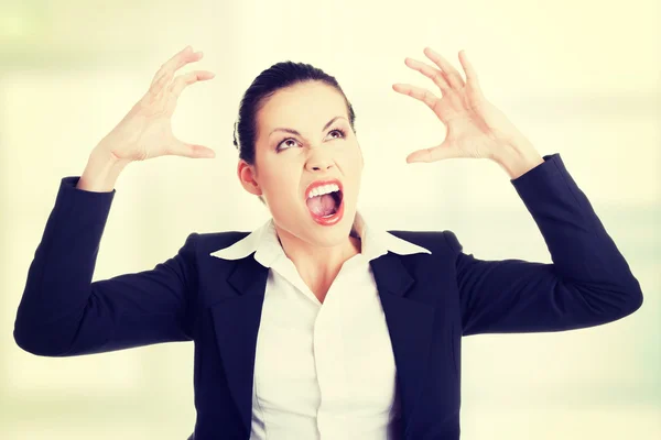Stressed or angry businesswoman screaming — Stock Photo, Image