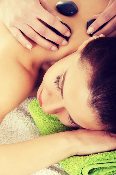 Beautiful woman lying on spa salon. — Stock Photo, Image