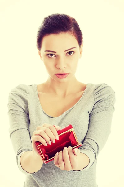 Beautiful casual woman showing her empty wallet. — Stock Photo, Image