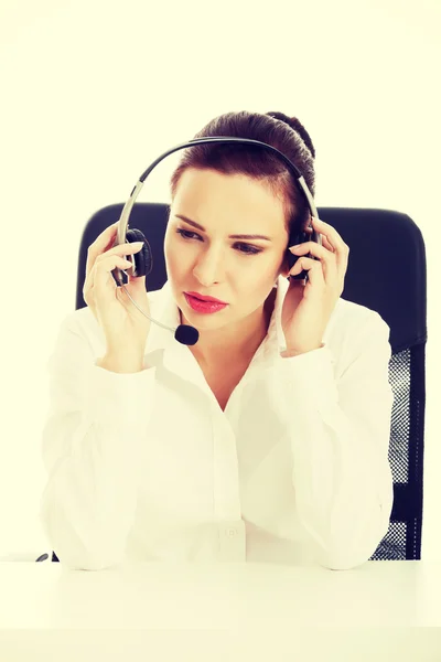 Beautiful woman sitting with microphone and headphones. — Stock Photo, Image