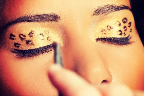 Close up on beautiful tiger make-up. — Stock Photo, Image