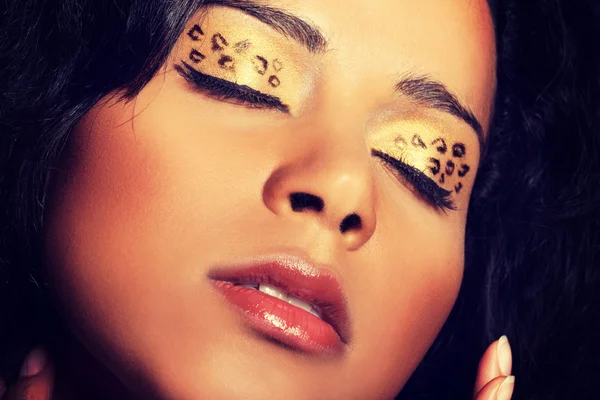 Primer plano en el maquillaje hermoso tigre . —  Fotos de Stock