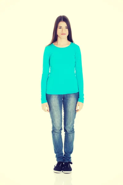 Young casual woman standing. — Stock Photo, Image