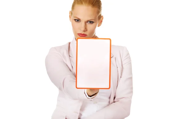 Young business woman holding a board with ban — Stock Photo, Image