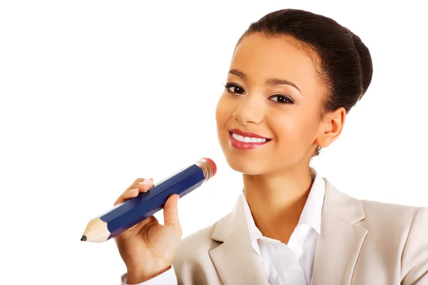 Businesswoman with big pencil. — Stock Photo, Image