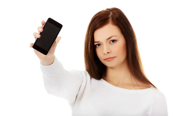 Young sad women showing broken touch screen mobile phone — Stock Photo, Image