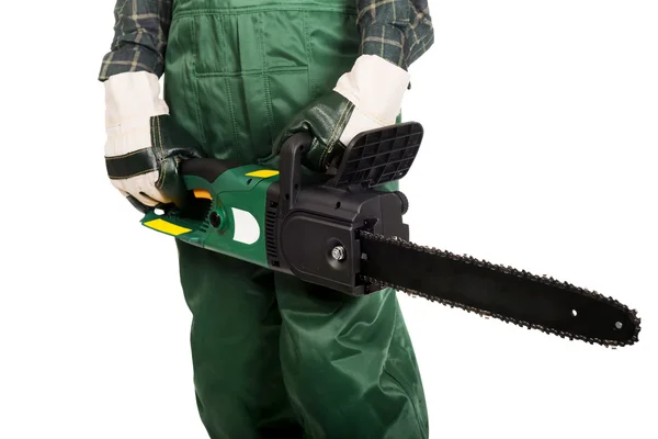 Gardener in uniform holding chainsaw — Stock Photo, Image