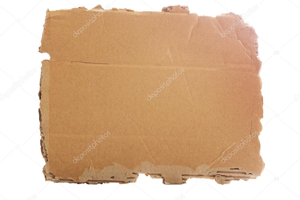 Brown corrugated cardboard torn and isolated on white.