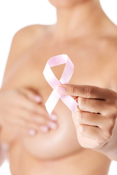 Topless woman with pink breast cancer ribbon. — Stock Photo, Image