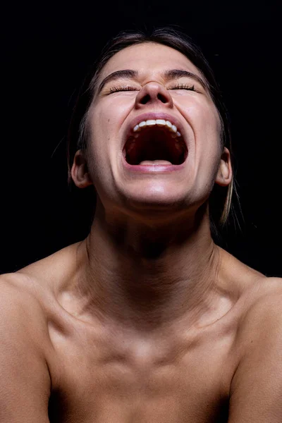 Screaming woman in black — Stock Photo, Image
