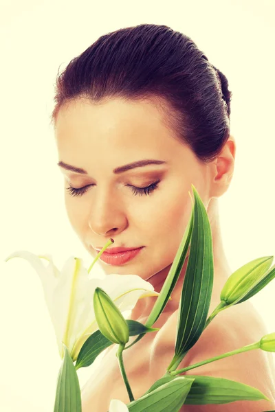 Beautiful topless woman with white lily. — Stock Photo, Image