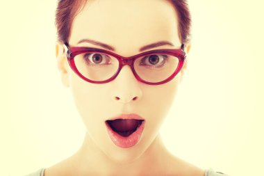 Young surprised woman in eyeglasses. clipart