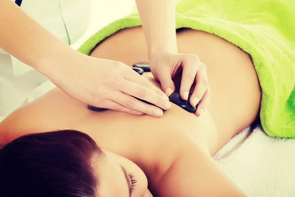 Beautiful woman lying on spa salon. — Stock Photo, Image