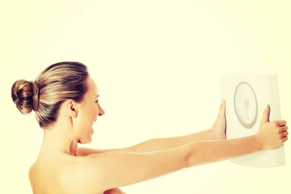 Nude topless woman holding scale. — Stock Photo, Image