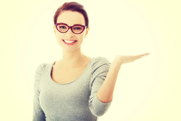 Beautiful casual woman with empty copy space on hands. — Stock Photo, Image