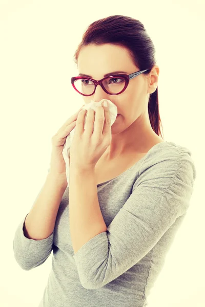 Casual beautiful woman in eyeglasses with tissue. — Stock Photo, Image