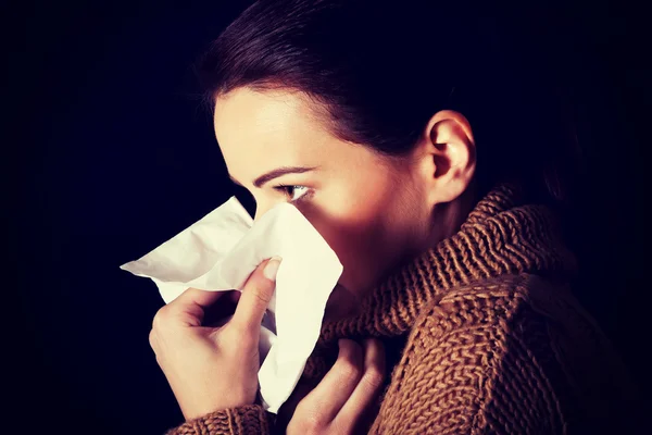 Sad young girl with tissue. — Stock Photo, Image