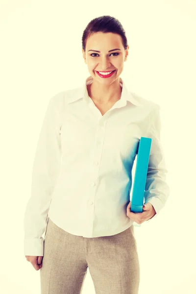 Beautiful young business woman holding file. — Stock Photo, Image