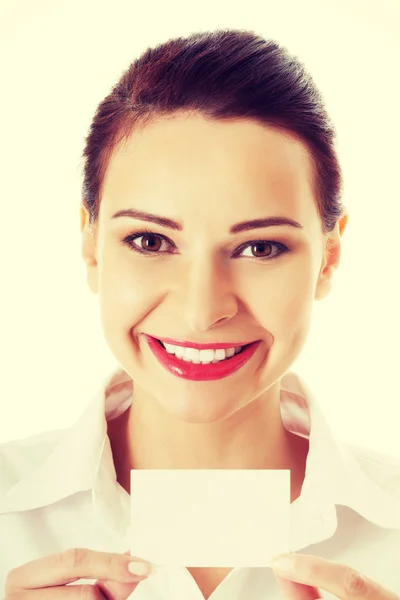 Beautiful business woman holding personal card. — Stock Photo, Image