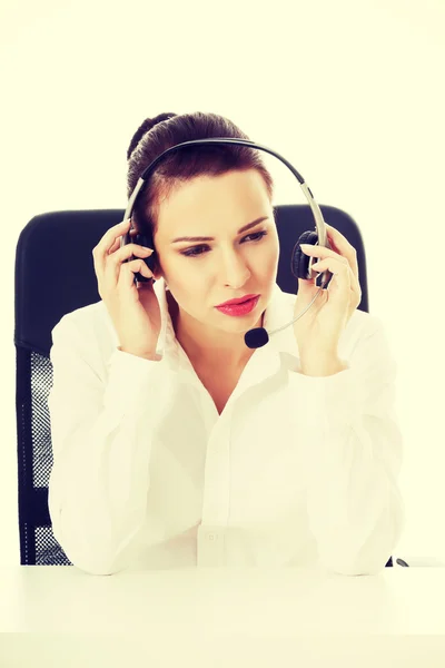 Beautiful woman sitting with microphone and headphones. — Stock Photo, Image