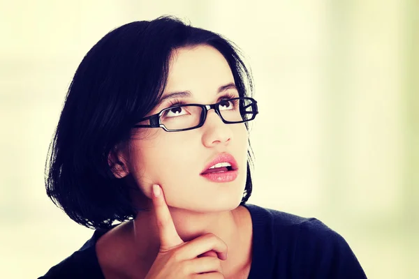 Young beautiful woman in casual clothes thinking — Stock Photo, Image