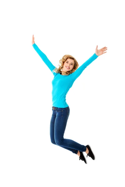 Young casual woman, student jumping. — Stock Photo, Image