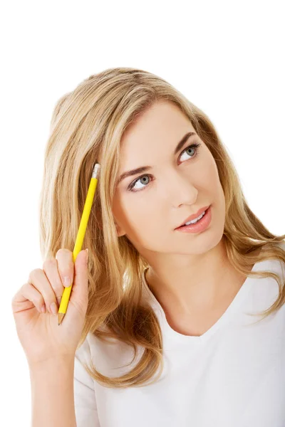 Thoughtful woman with pencil — Stock Photo, Image